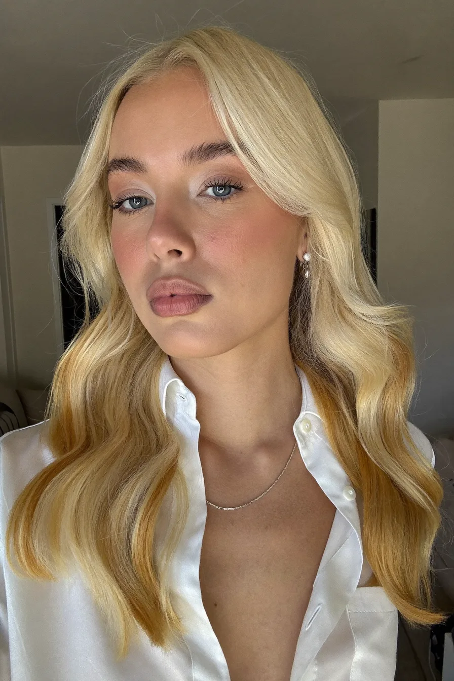 Modern Platinum Blonde Long Layers with Curtain Bangs