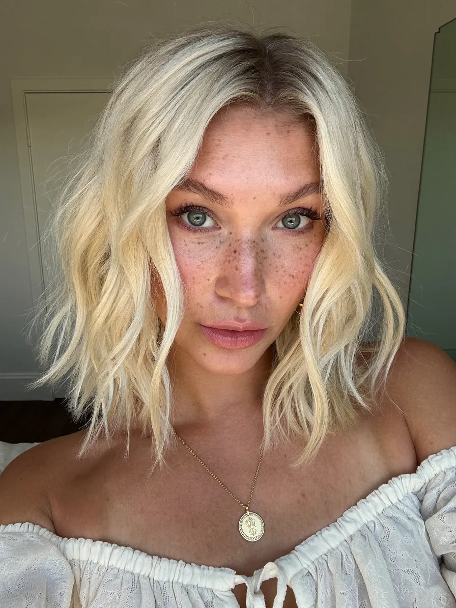 Modern Textured Shoulder-Length Platinum Blonde Lob