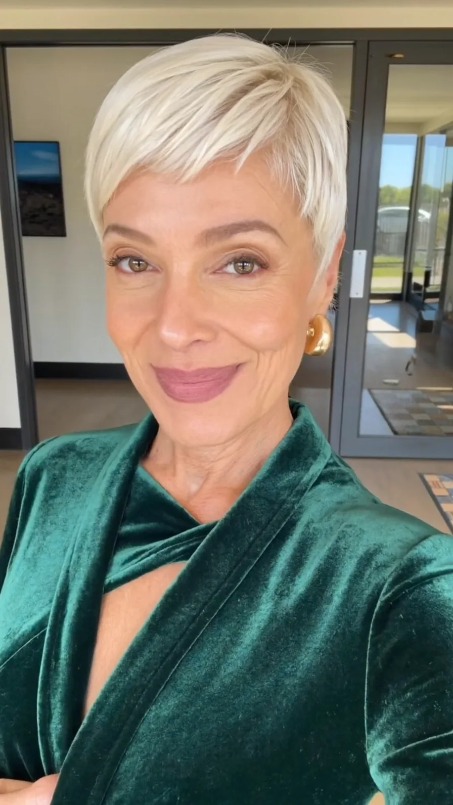 Elegant Platinum Blonde Textured Pixie Cut with Side Bangs