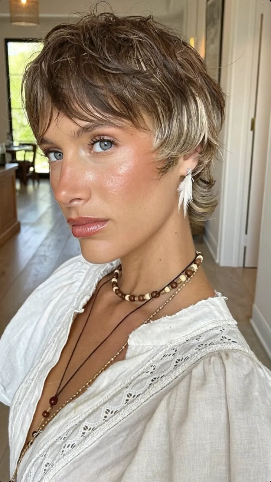 Modern Textured Pixie Mullet with Platinum Money_piece Accents