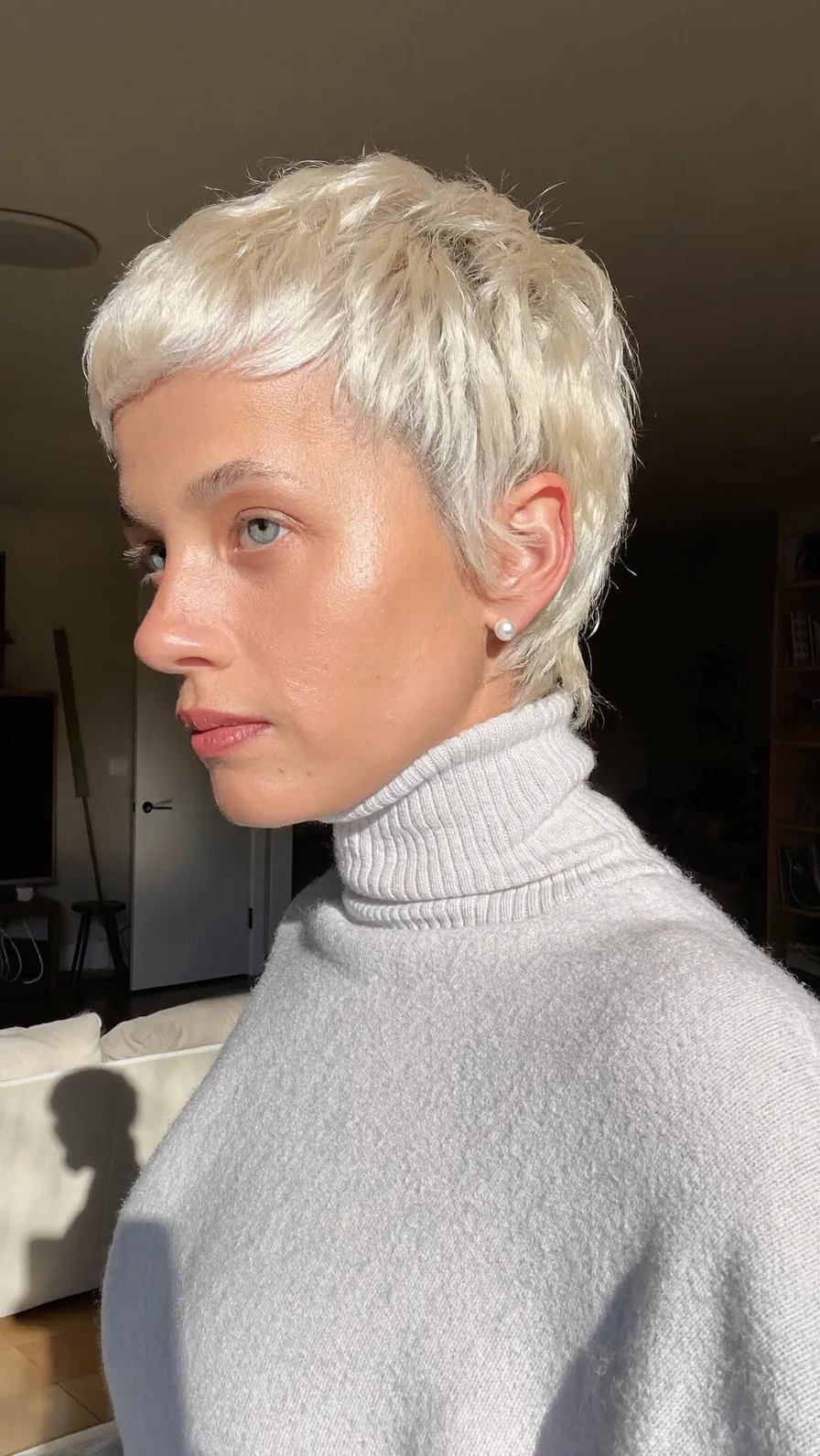 Modern Textured Platinum Blonde Pixie with Blunt Bangs