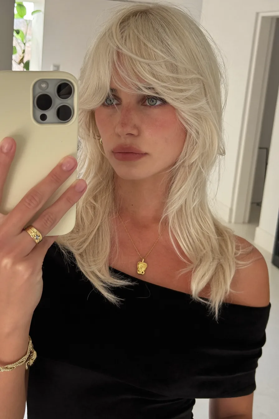Textured Medium Platinum Blonde Shag with Curtain Bangs