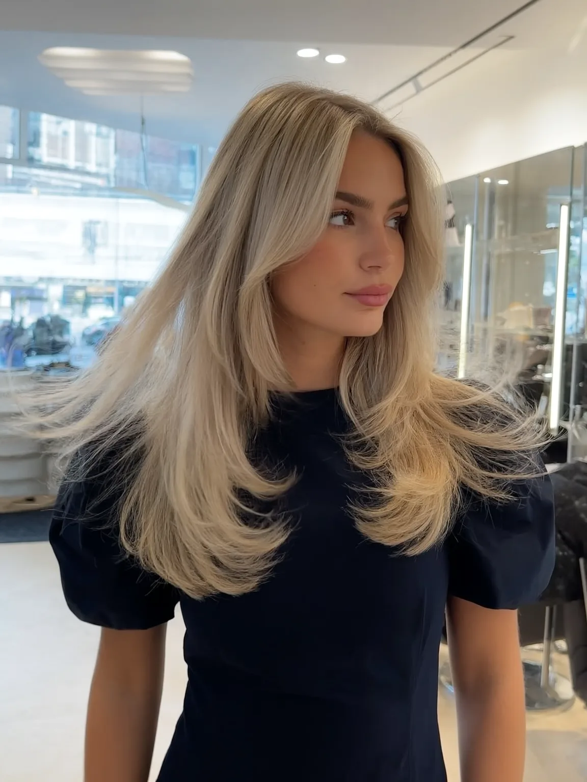 Curtain-Bang Platinum Blonde Layers