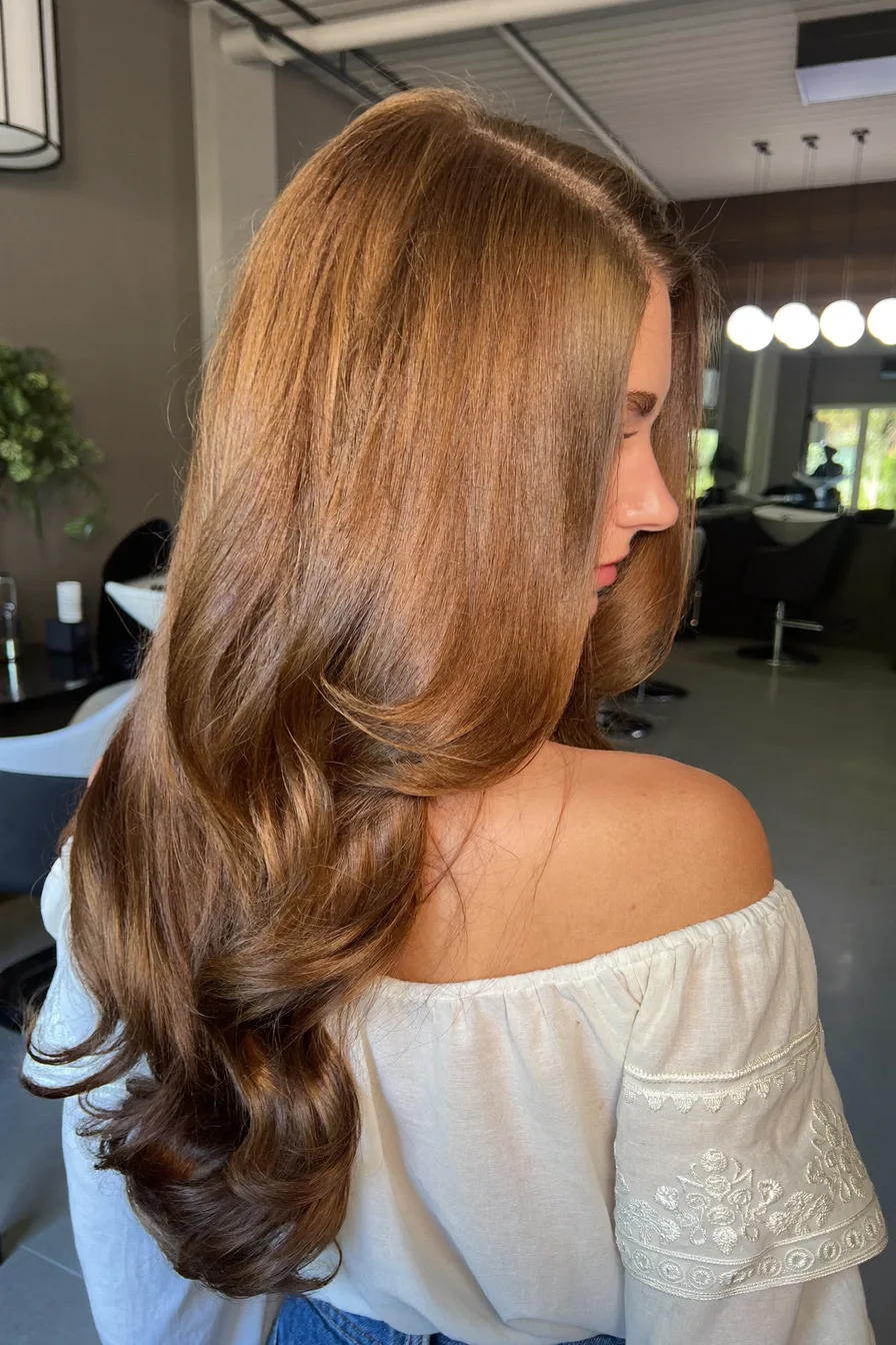 Voluminous Long Layered Cut with Soft Face-Framing Layers