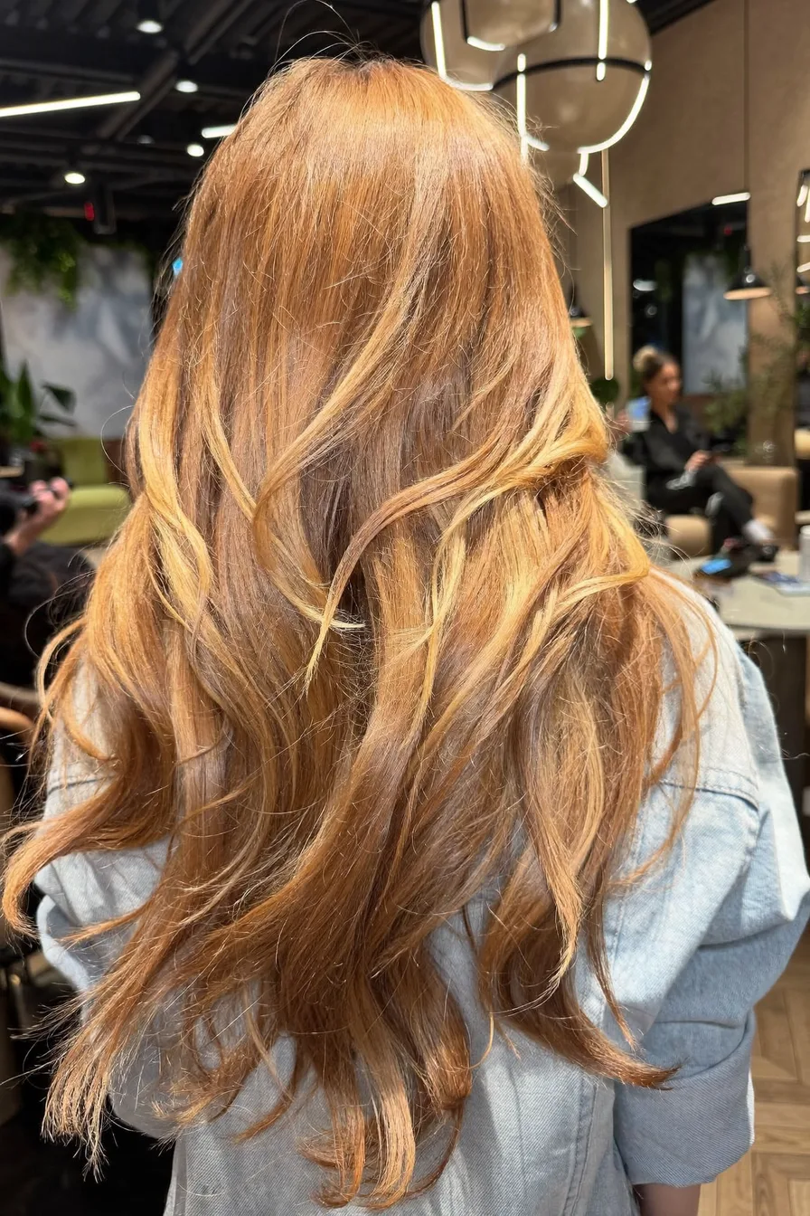 Voluminous Long Layered Cut with Soft Face-Framing Layers