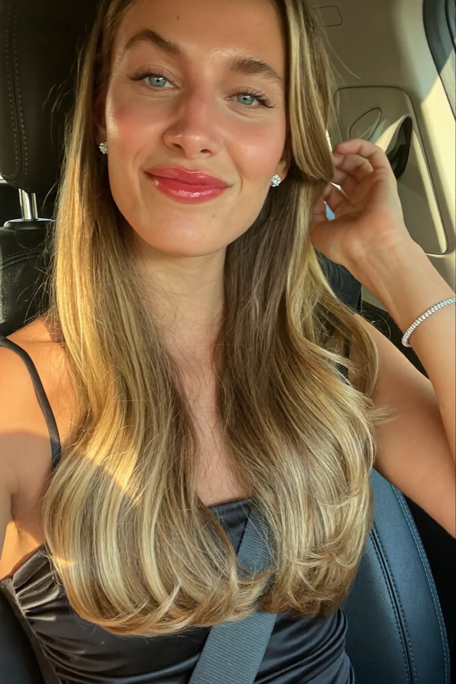Soft Face-Framing Layers in Classic Long Layered Blonde Haircut