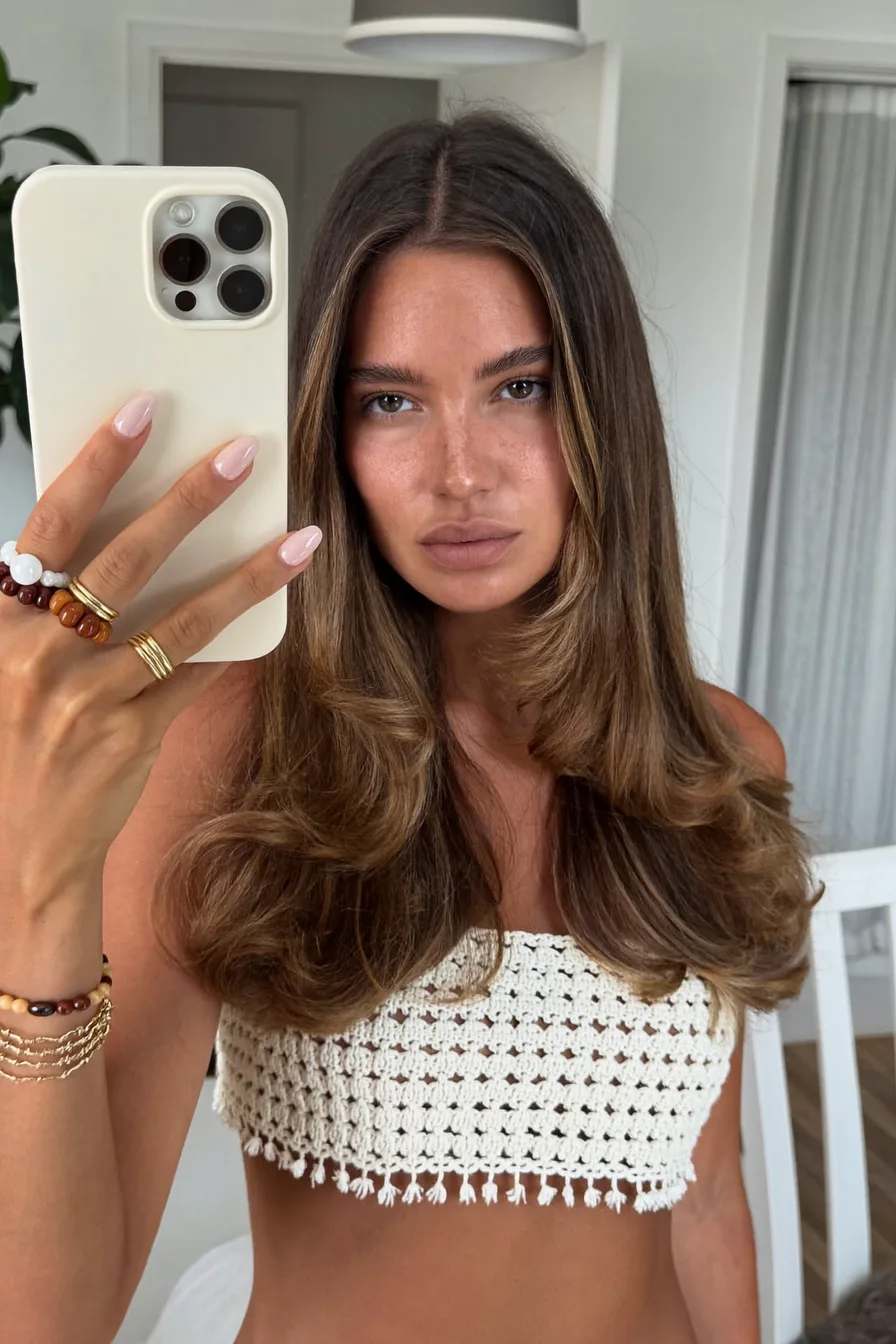 Soft Face-Framing Layers on Voluminous Long Layered Hair
