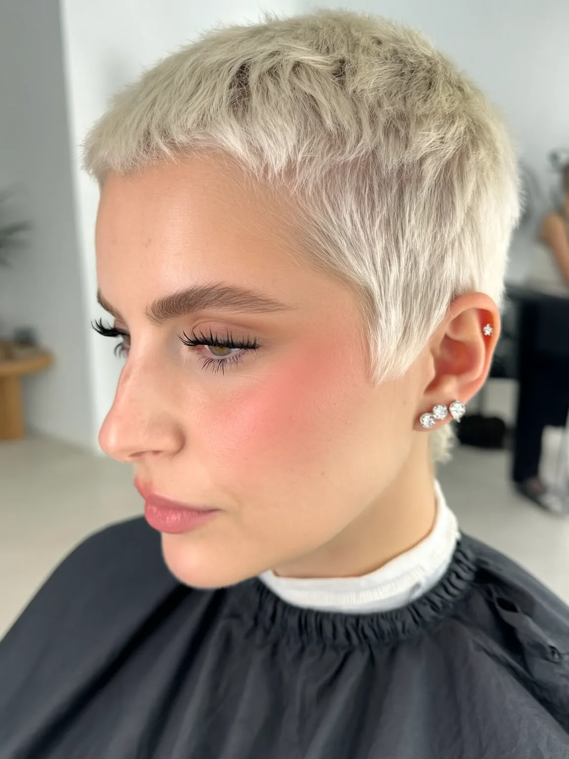 Platinum Blonde Pixie with Micro Bangs and Flat Texture