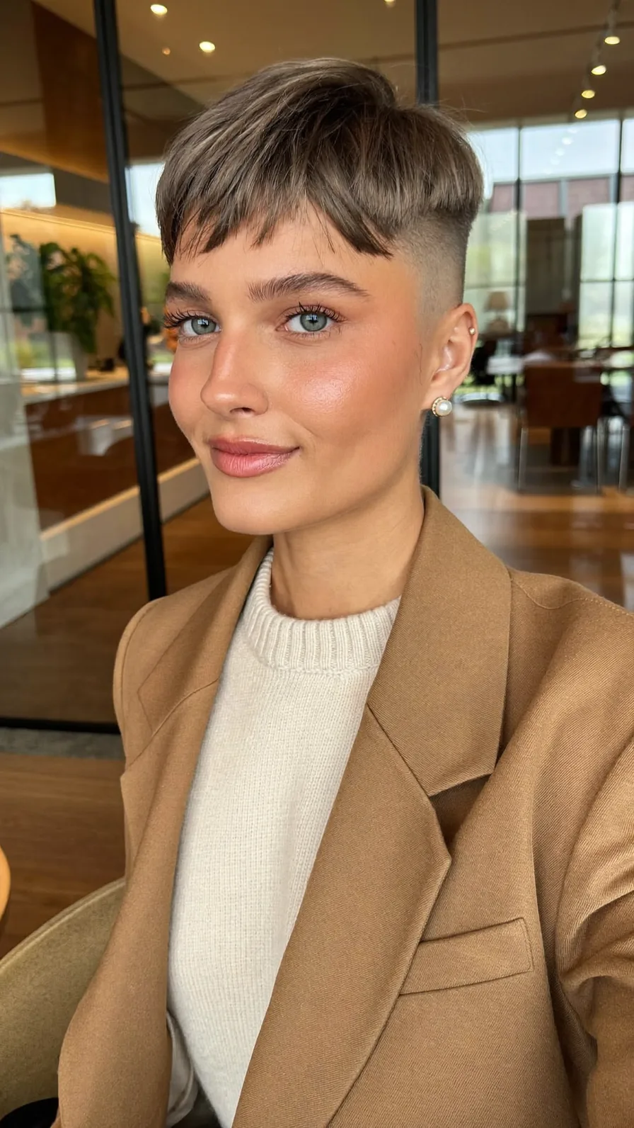 Edgy Modern Pixie Cut with Micro Bangs and Undercut