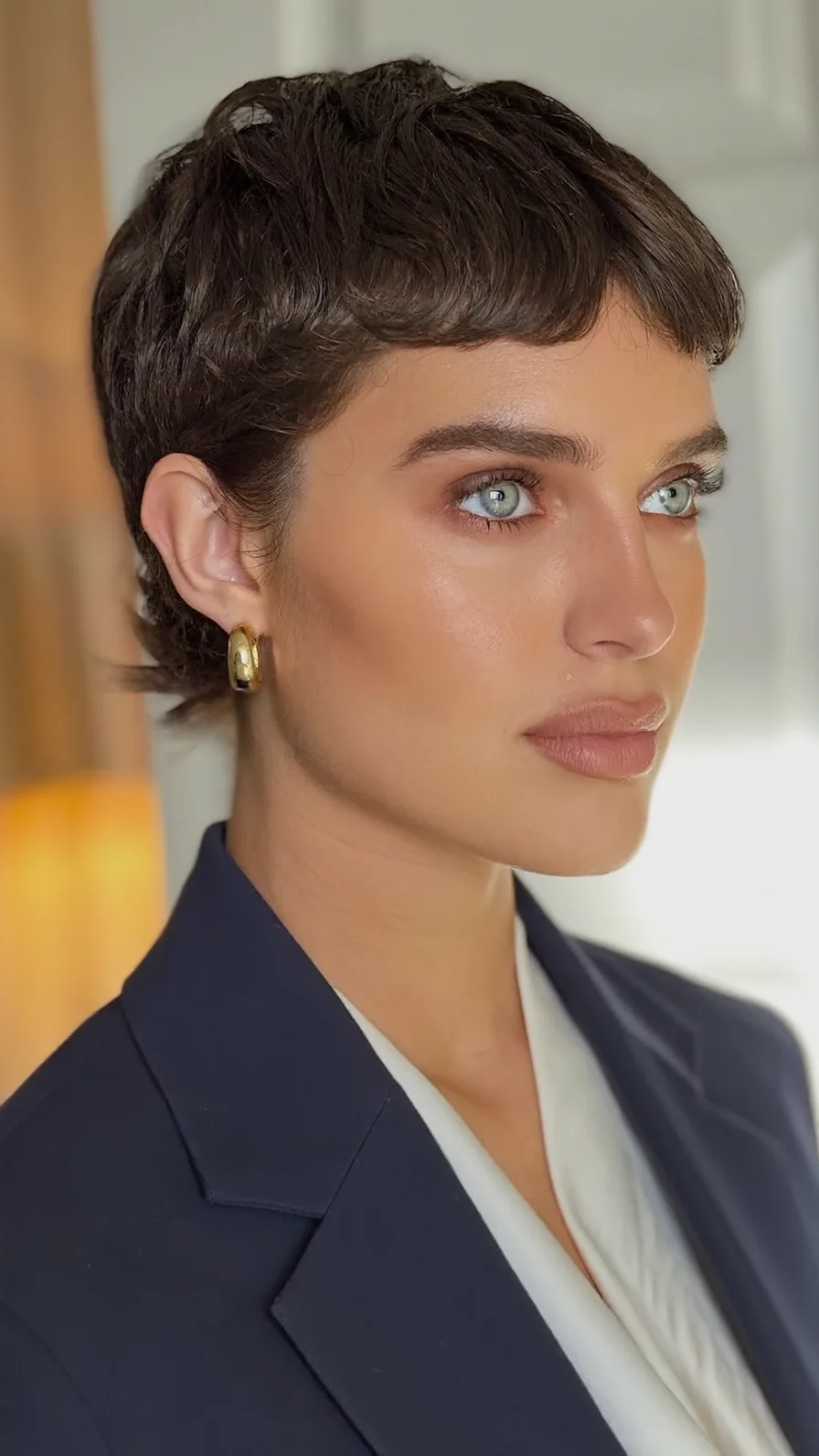 Textured Micro Bang Pixie Cut With Choppy Layers