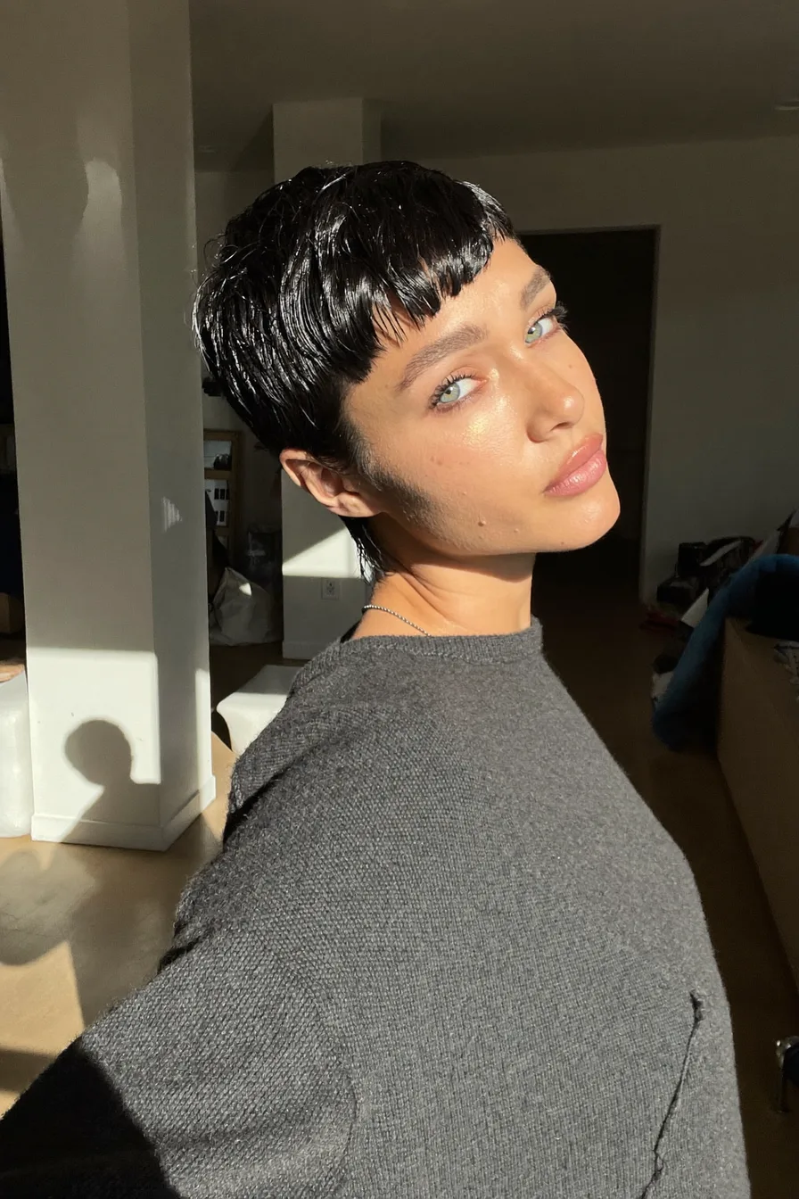 Chic Jet Black Pixie Cut with Textured Micro Bangs