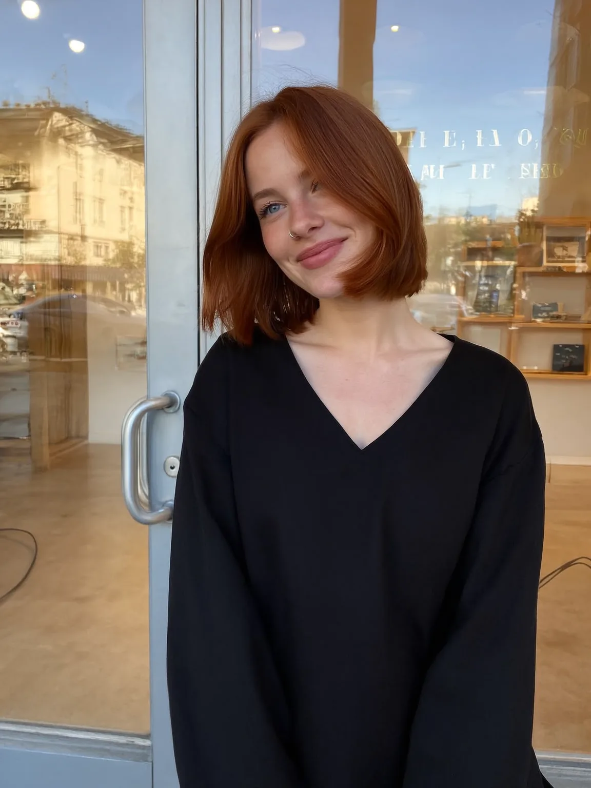 Chin-Length Straight Copper Bob with Side-Swept Bangs