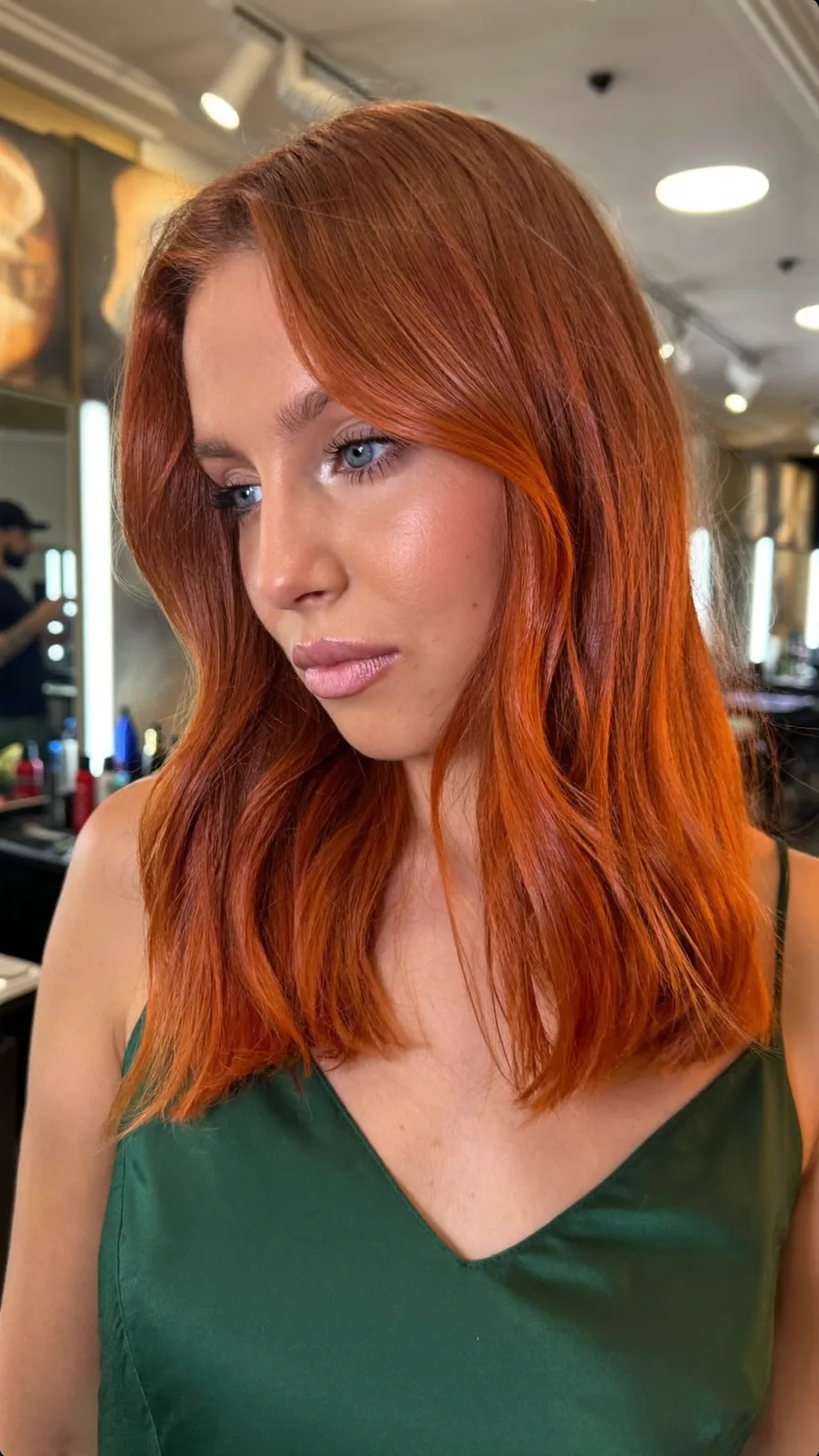 Vibrant Copper Medium Length Hair with Curtain Bangs