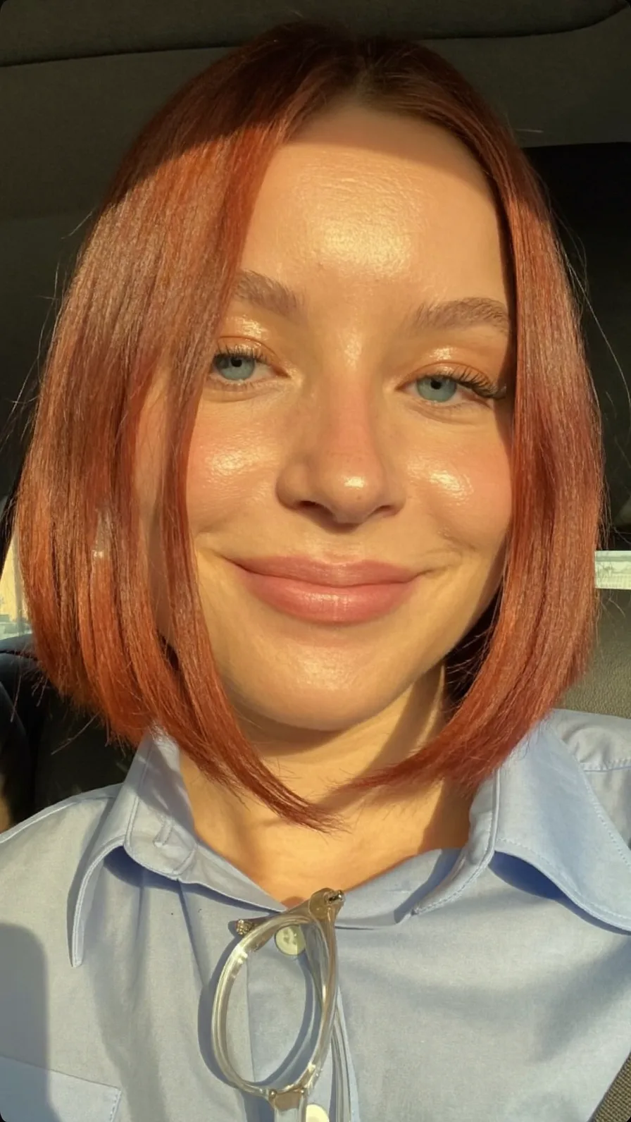 Sleek Chin-Length Copper Bob with Center-Parted Bangs