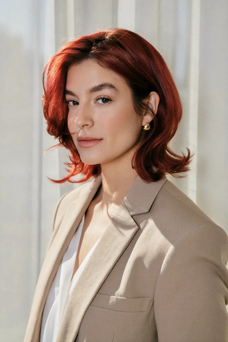 Vibrant Copper Red Shoulder-Length Flicked Long Layers