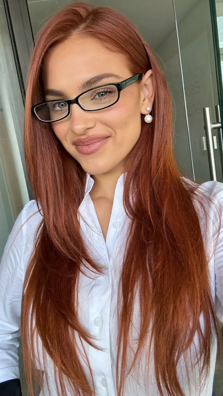 Sleek Copper Red Long Layers with Side Part