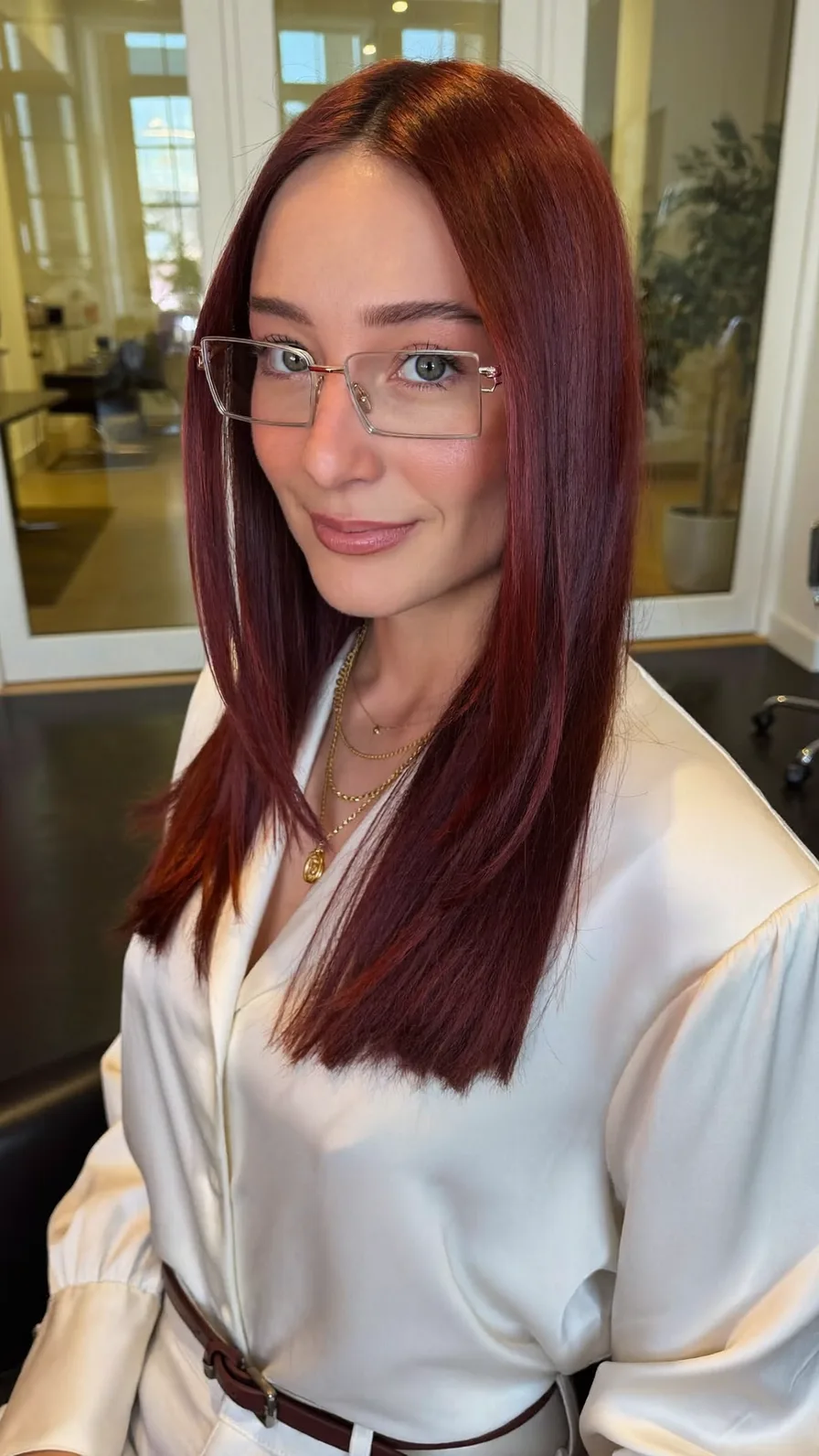Sleek Deep Burgundy Long Layered Hair with Center Part
