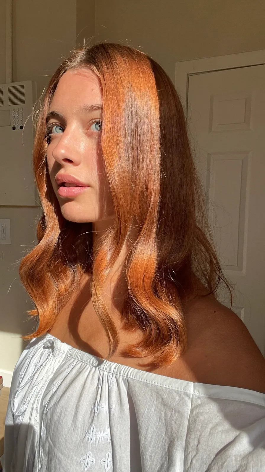 Classic Shoulder-Length Warm Copper Wavy Long Layers Hairstyle