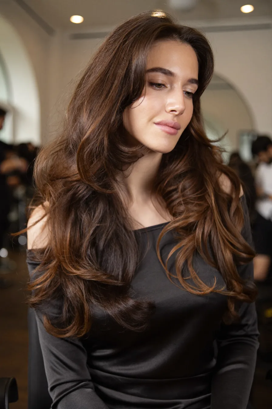 Voluminous Chocolate Brown Long Layered Hair with Soft Waves