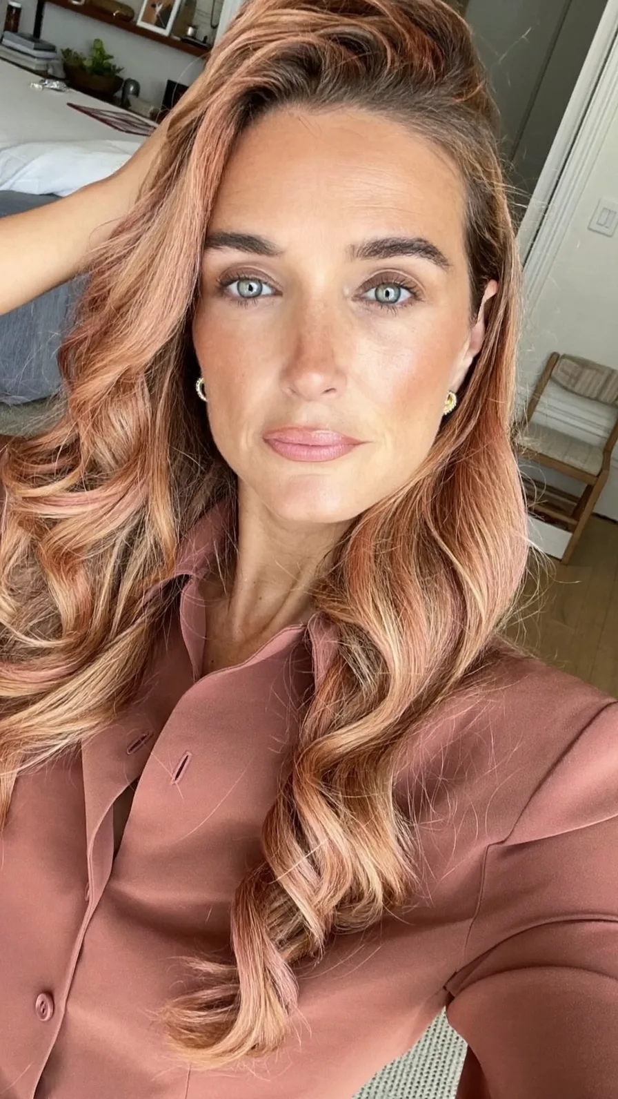 Long Layered Rose Gold Waves with Subtle Balayage Shimmer