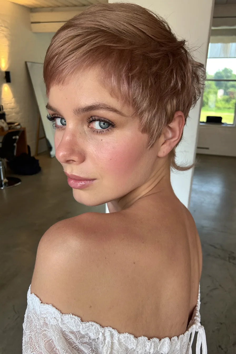 Soft Textured Pixie Cut with Rose Gold Elegance