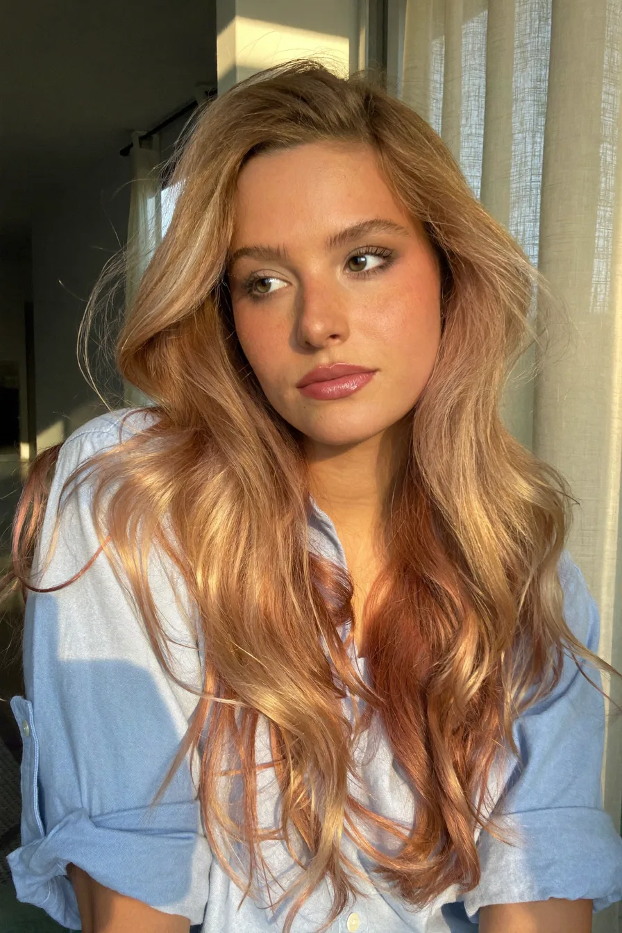 Voluminous Honey Blonde Long Layers with Flowing Waves