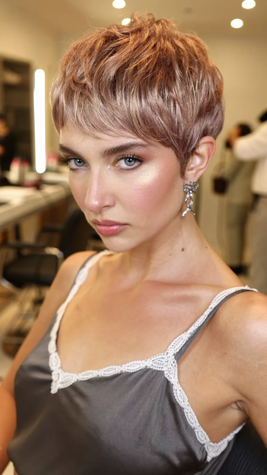 Modern Textured Rose Gold Pixie with Soft Wispy Bangs