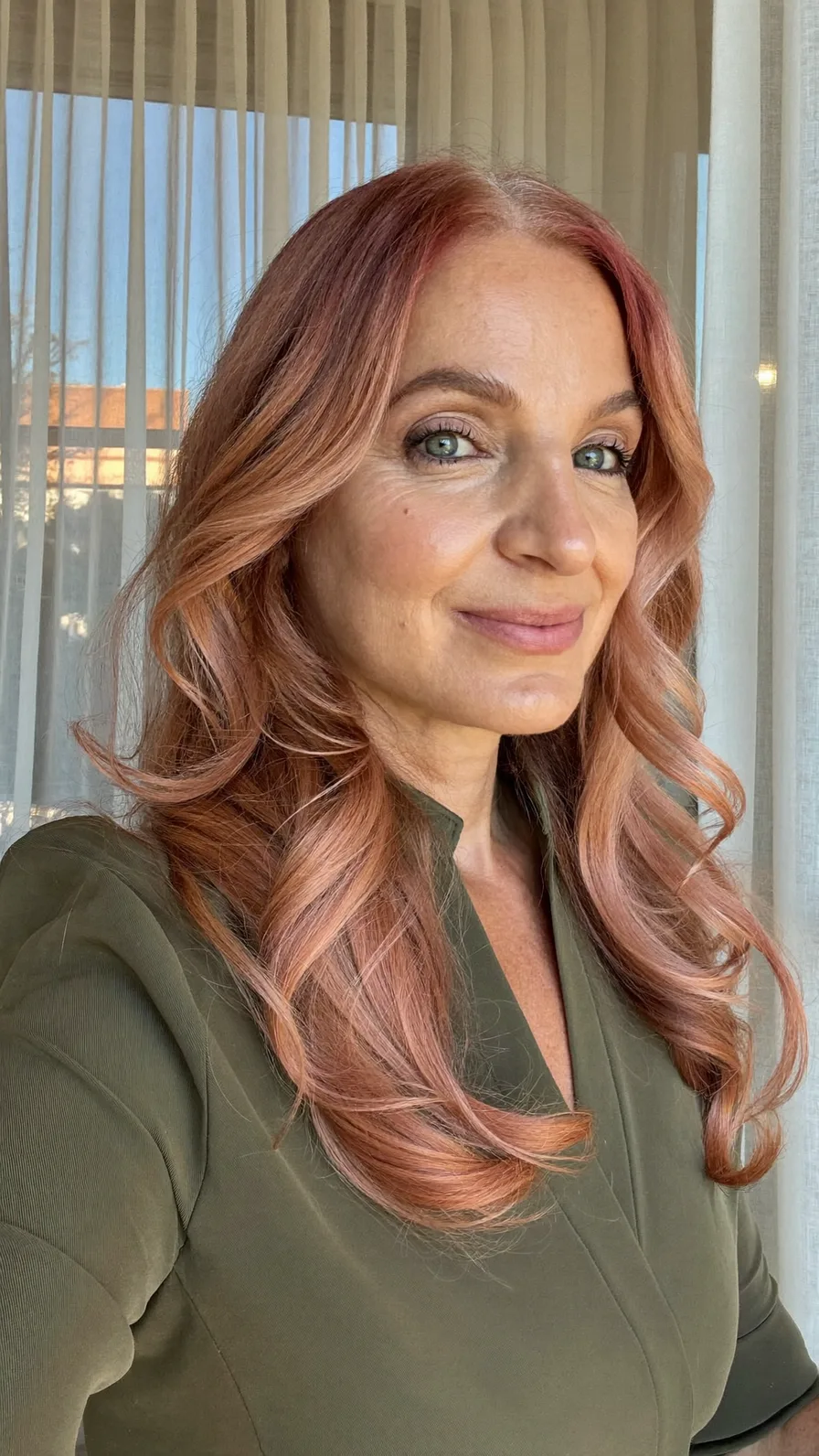 Modern Rose Gold Long Layers with Flowing Loose Curls