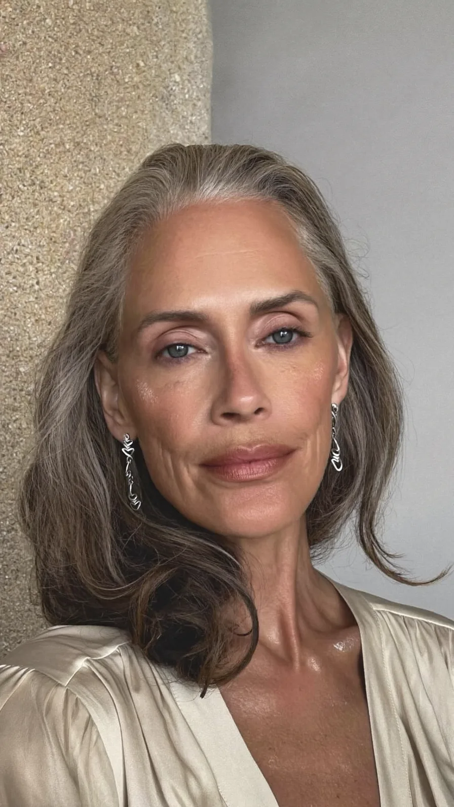 Elegant Shoulder-Length Wavy Long Layers with Natural Gray
