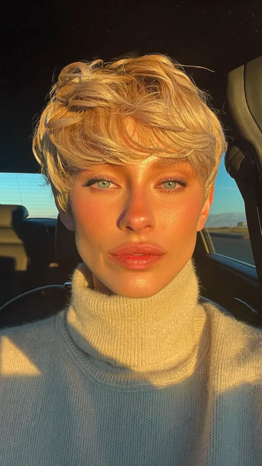 Voluminous Textured Pixie Cut with Side-Swept Waves