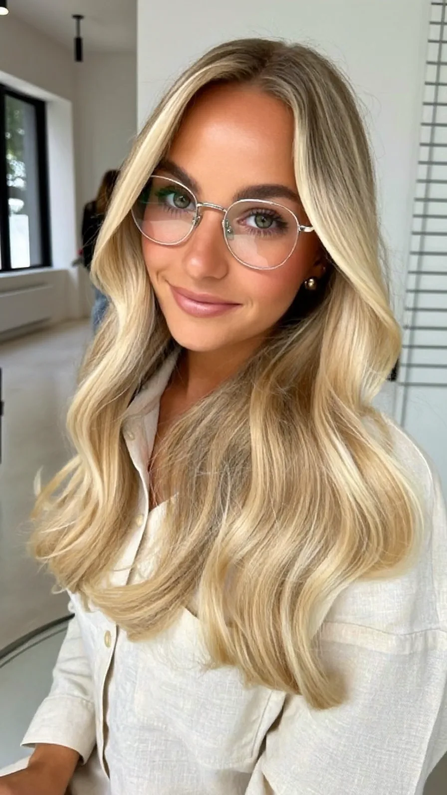 Classic Long Layered Sandy Blonde Hair with Flowing Waves
