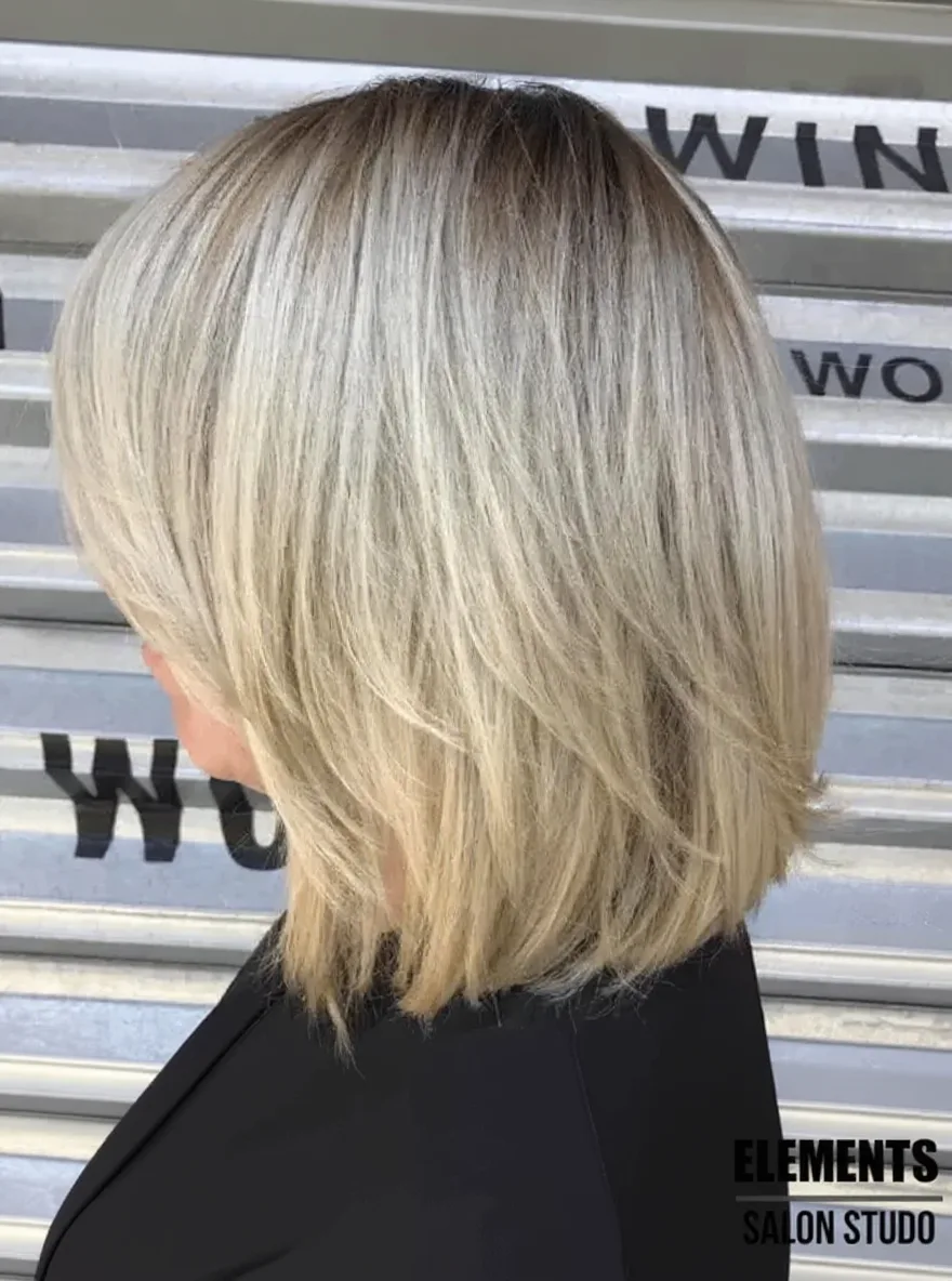 cool sandy blonde lob
