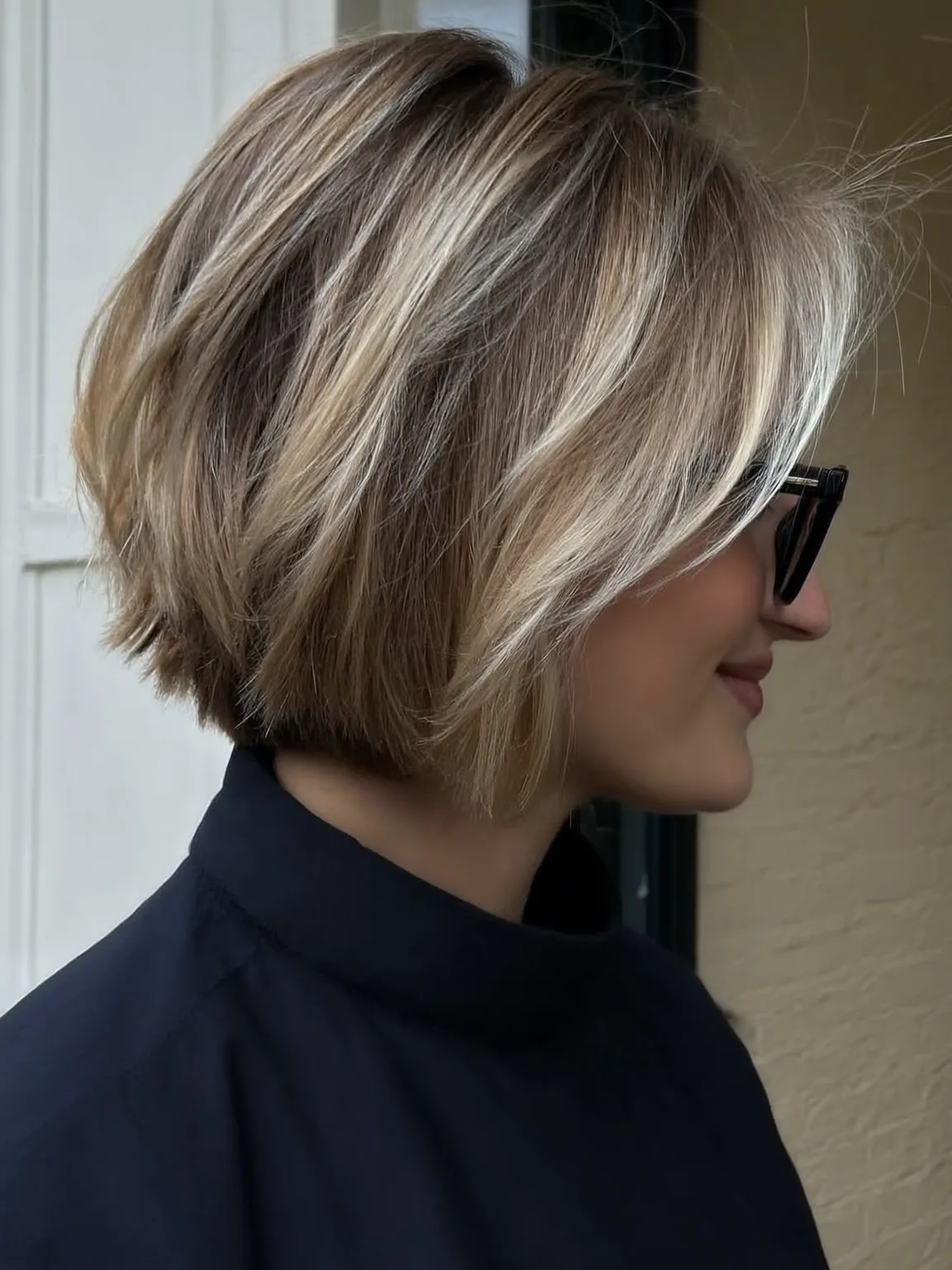 Voluminous Wavy Chin-Length Bob with Natural Lowlights