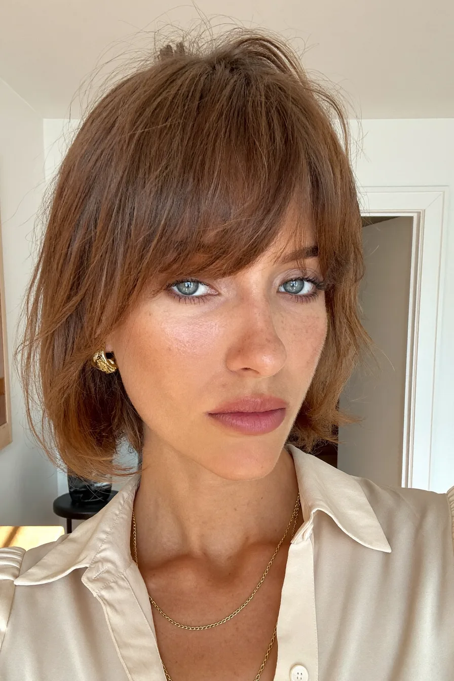 Chin-Length Shag with Soft Wispy Bangs for Casual Texture
