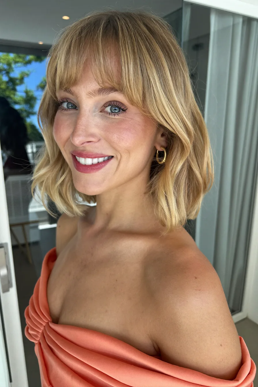 Soft Blonde Shag Cut with Feathered Wispy Bangs for Texture