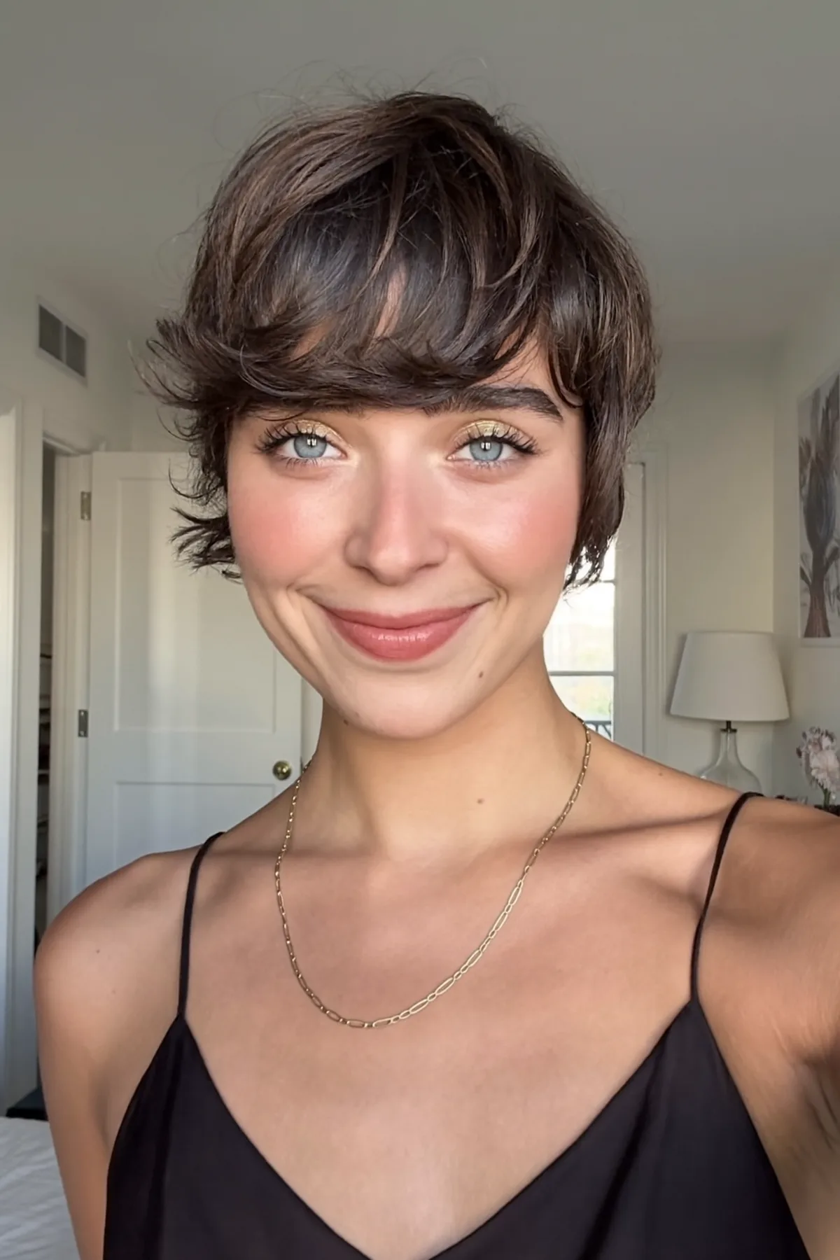 Chin-Length Natural Brunette Shag with Wavy Texture and Full Fringe Bangs