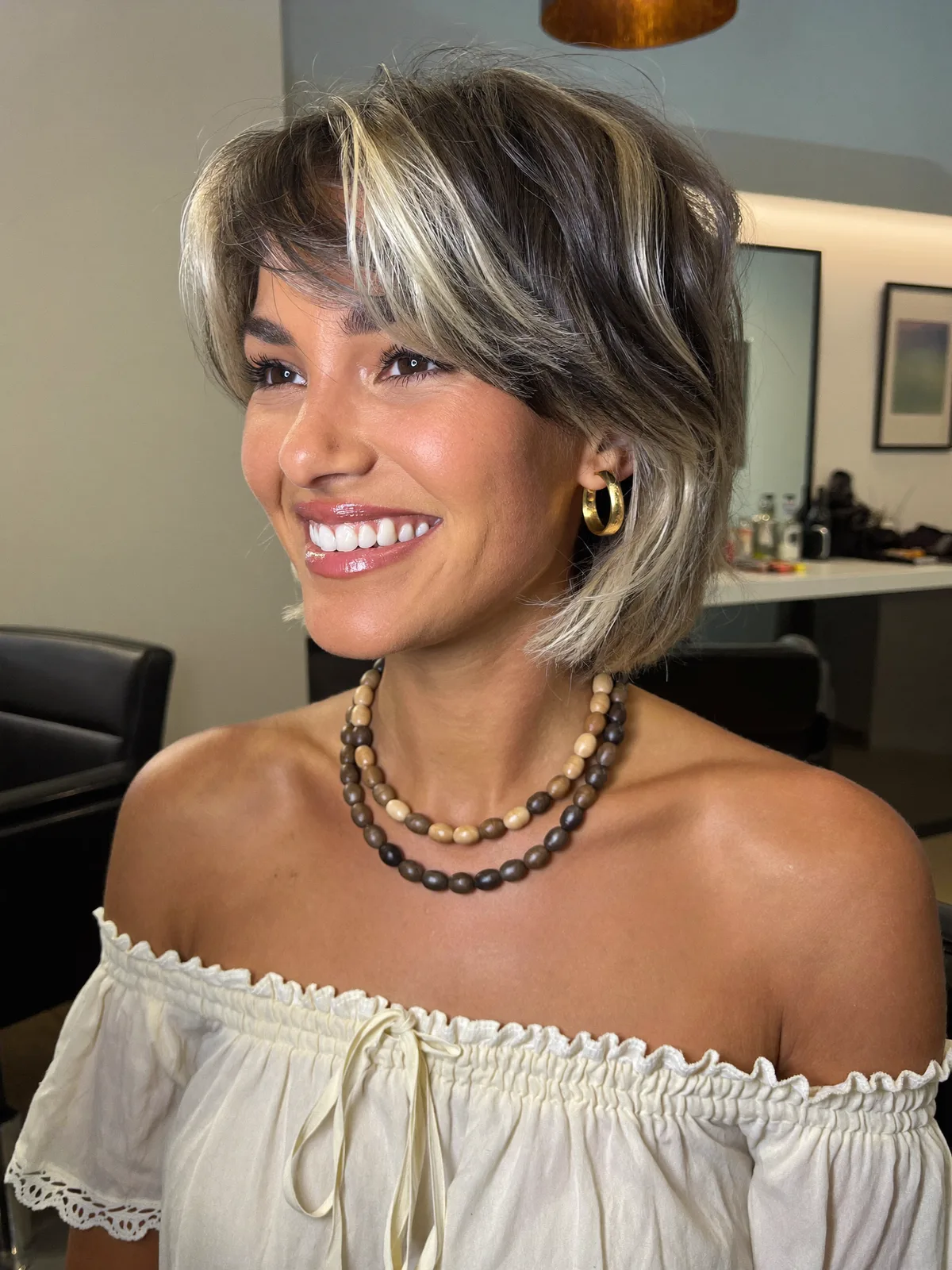Shoulder-Length Platinum Ash Blonde Shag with Chunky Highlights