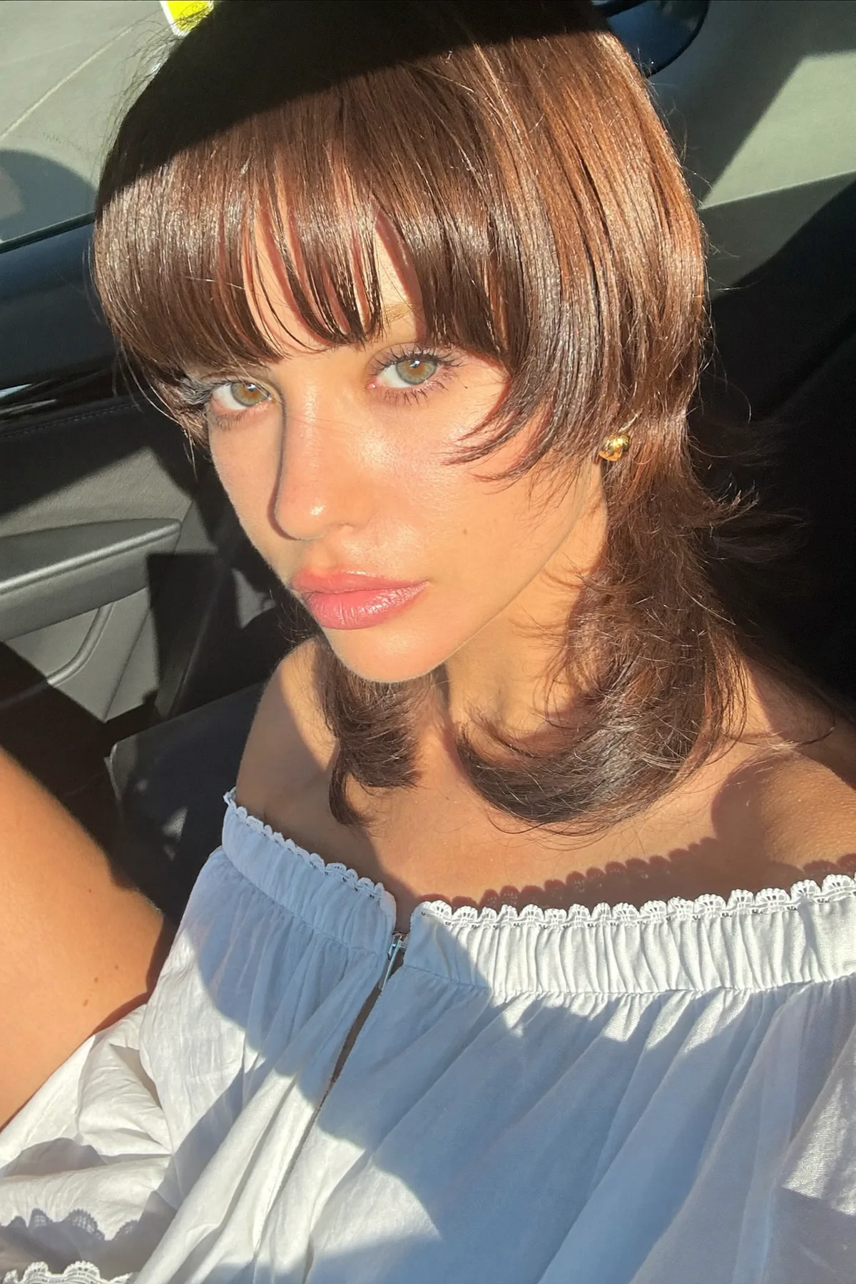 Sleek Shoulder-Length Auburn Copper Shag with Full Fringe Bangs