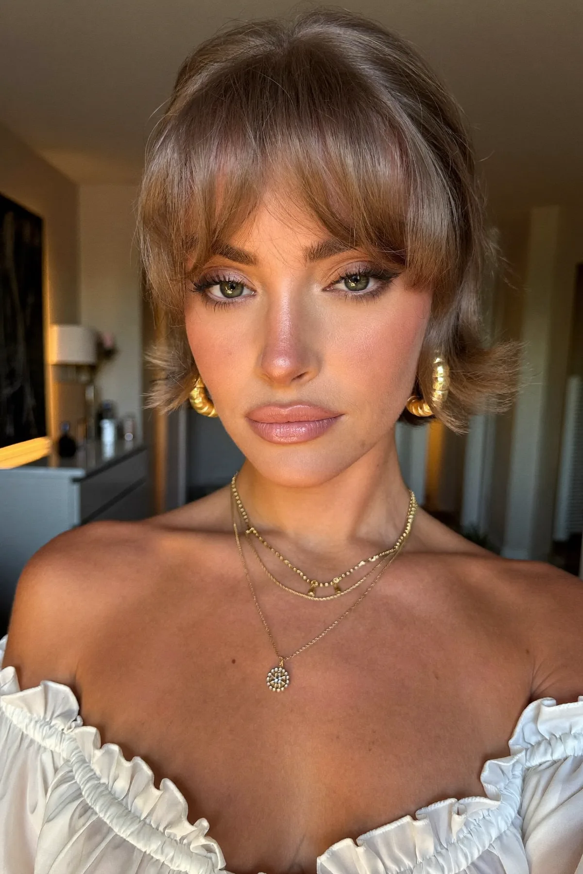 Chin-Length Gray Shag with Wavy Texture and Curtain Bangs