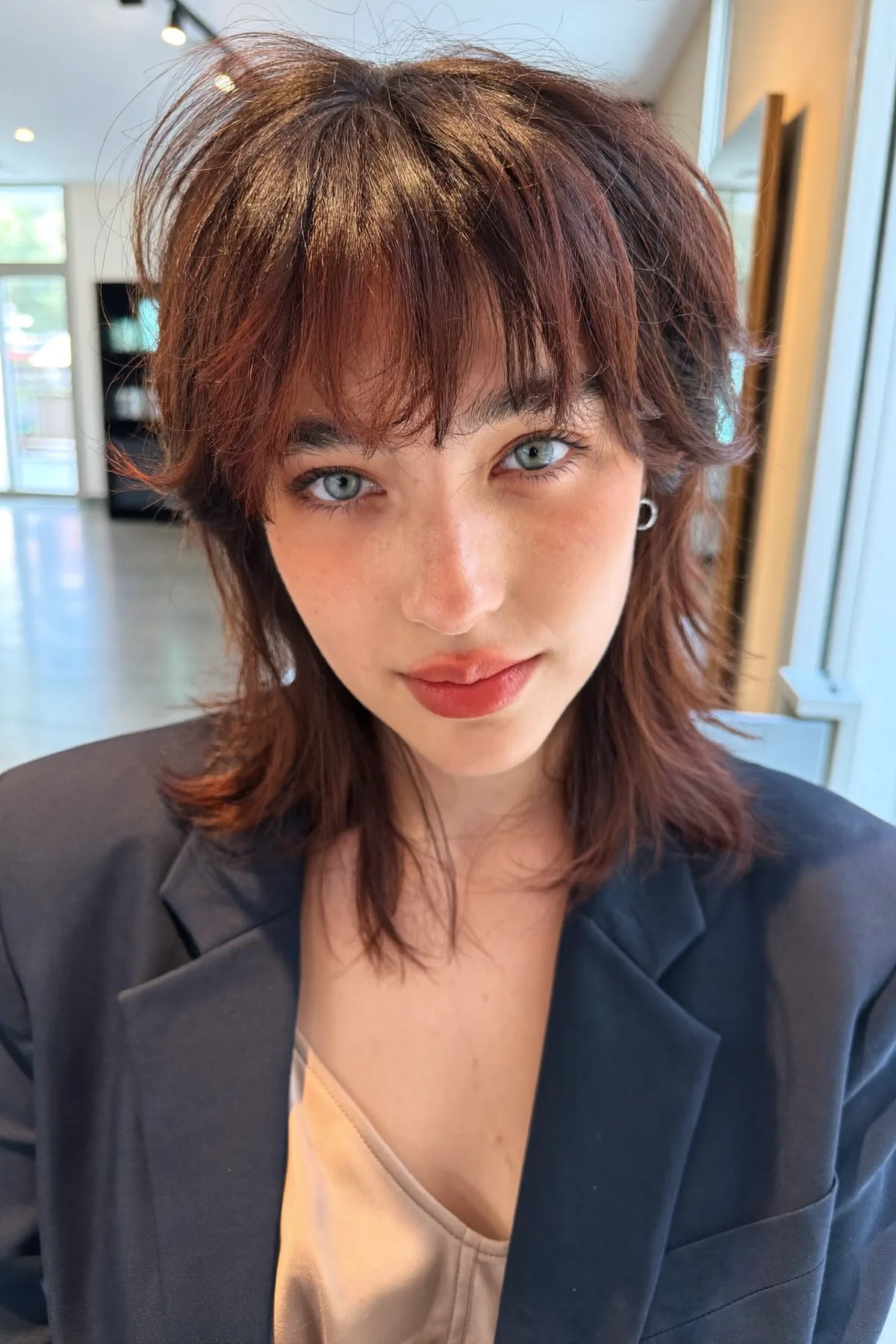 Collarbone-Length Auburn Copper Shag with Full Fringe Bangs