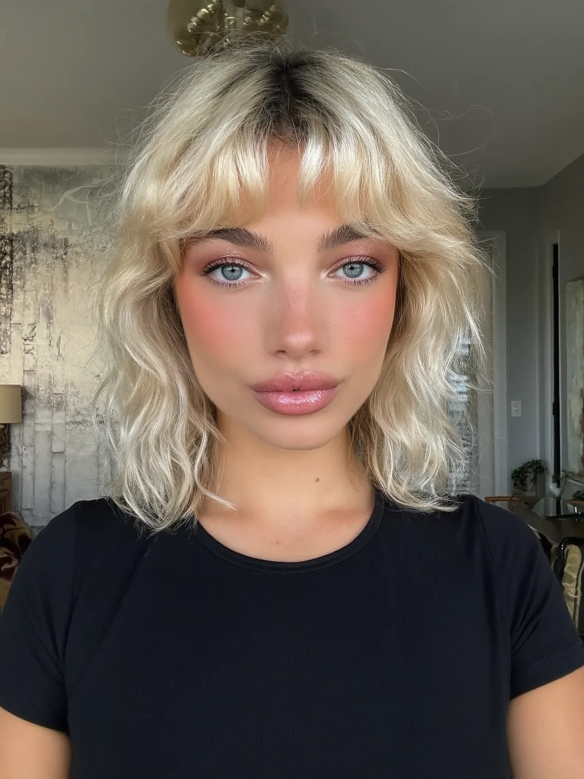 Platinum Blonde Shoulder-Length Shag with Wispy Bangs