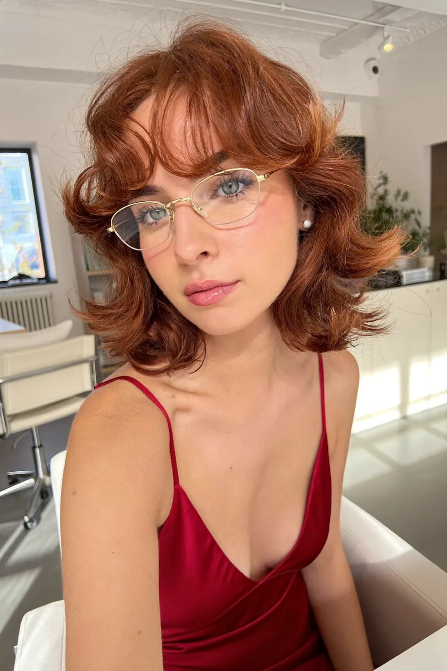 Shaggy Bob with Soft Layers and Wispy Curtain Bangs