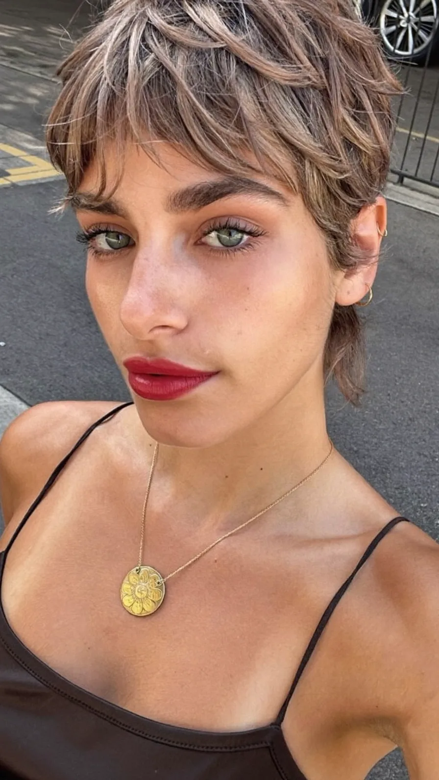 Modern Textured Pixie Cut with Wispy Side-Swept Bangs
