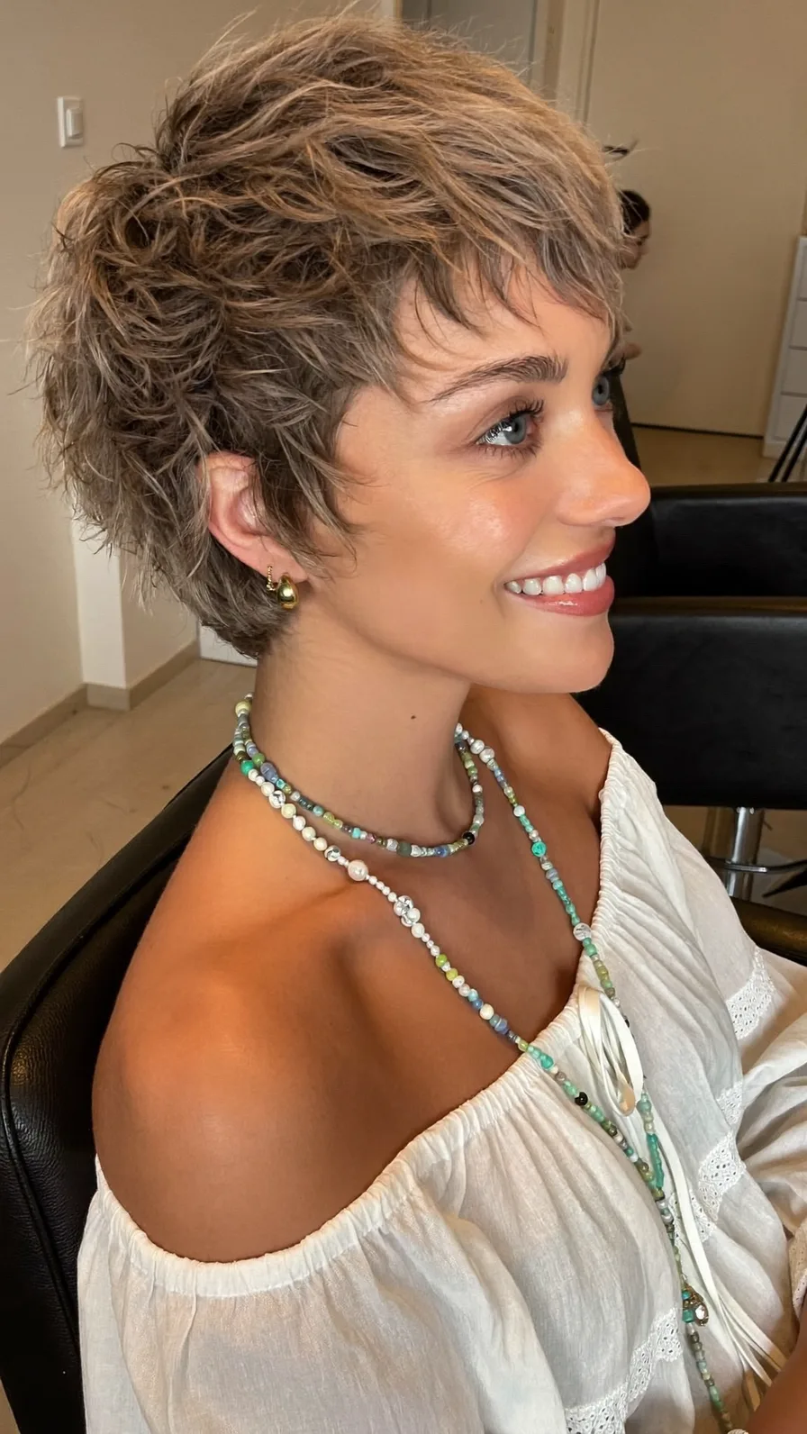 Modern Textured Ash Brown Pixie with Side-Swept Bangs