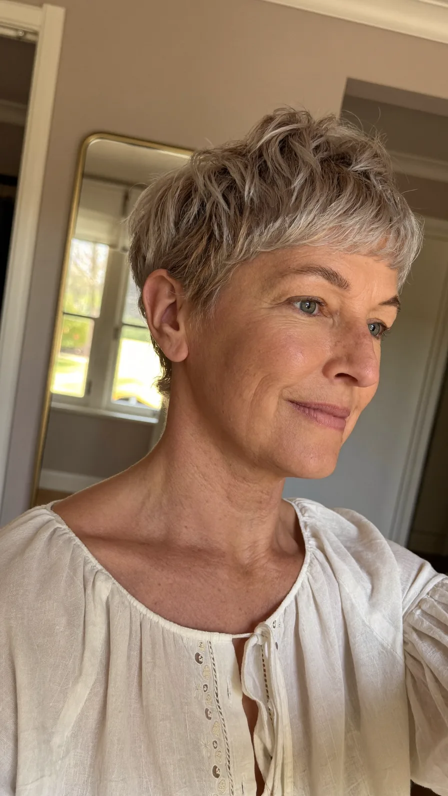 Modern Textured Pixie Cut with Ash Blonde Highlights