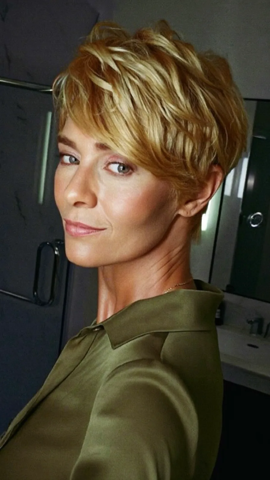 Textured Side-Swept Pixie Cut with Multi-Dimensional Blonde Balayage