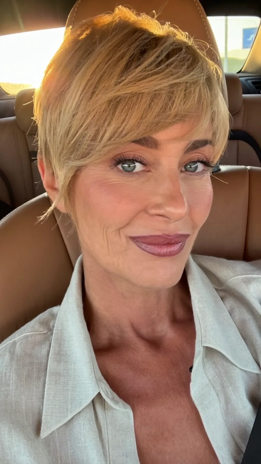 Textured Warm Honey Blonde Side-Swept Pixie Cut for Mature Women
