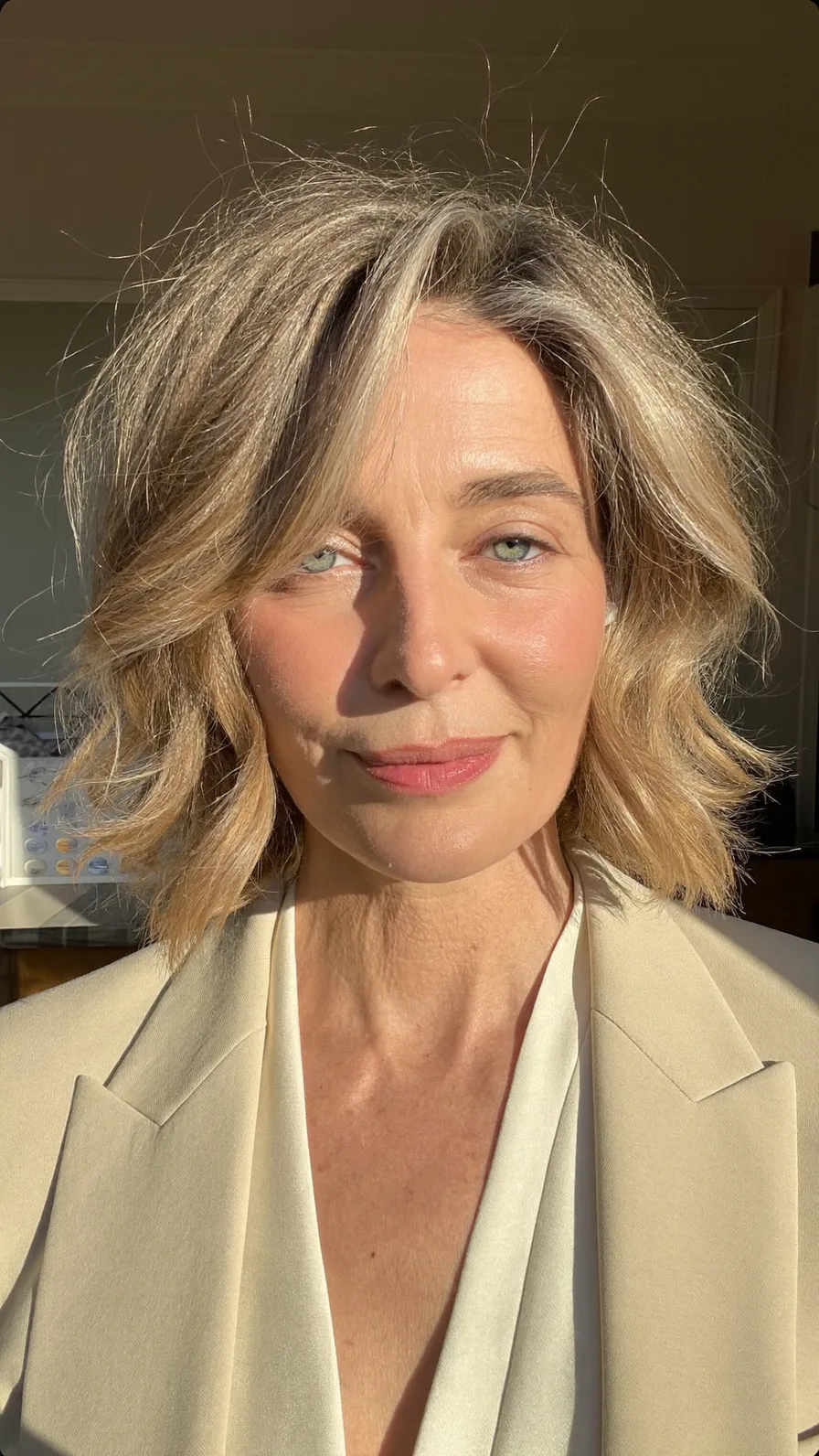 Chin-Length Textured Lob with Side-Swept Bangs and Balayage