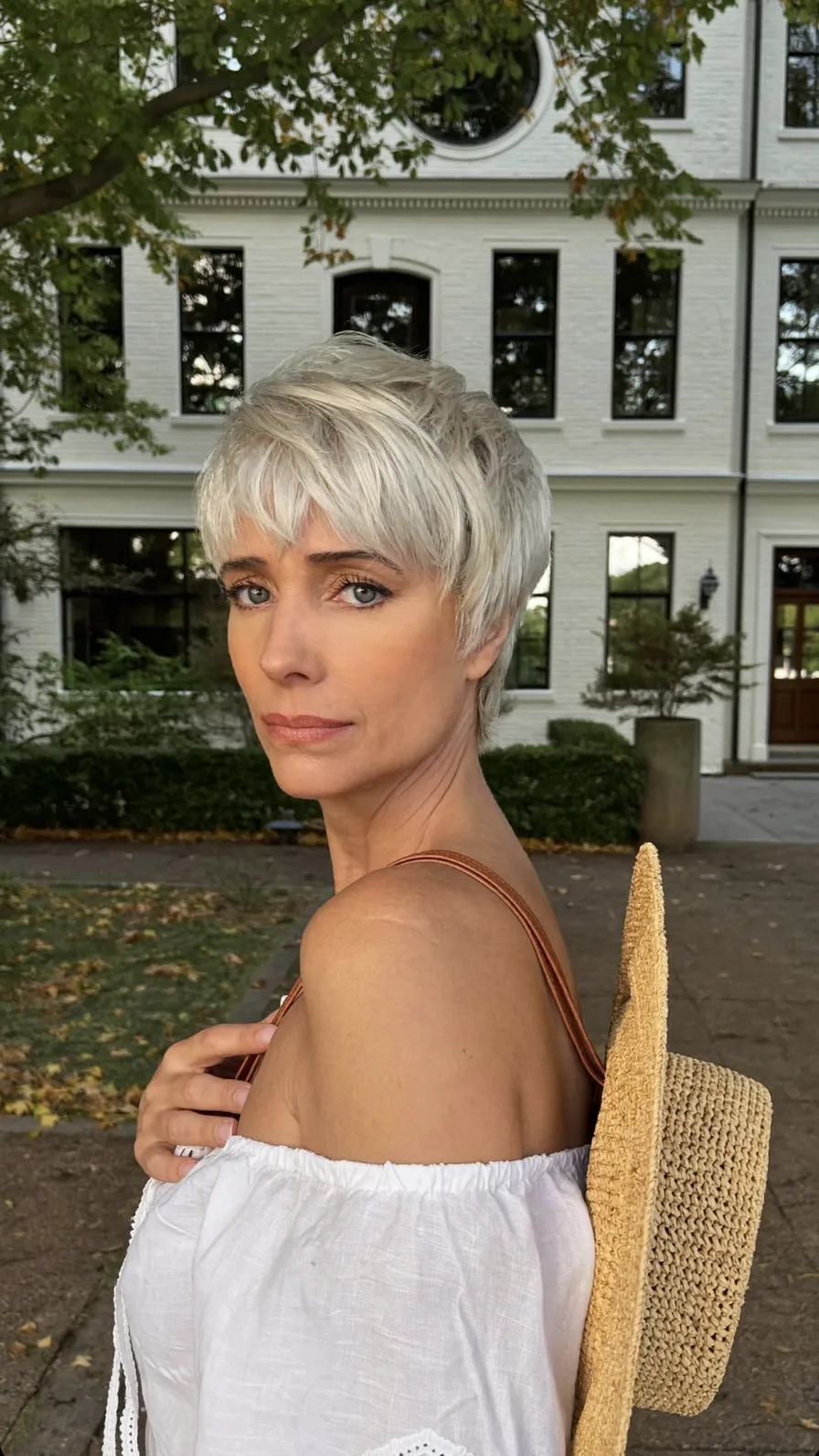 Chic Platinum Blonde Wispy Pixie with Textured Short Layers