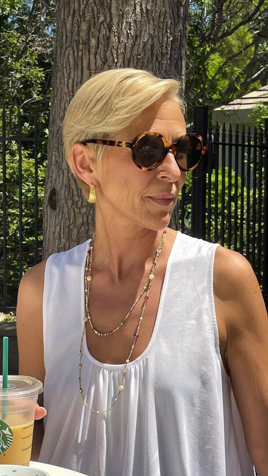 Elegant Platinum Blonde Side-Swept Classic Pixie Cut